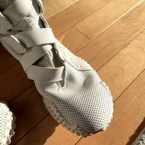 Unique white Puma boots